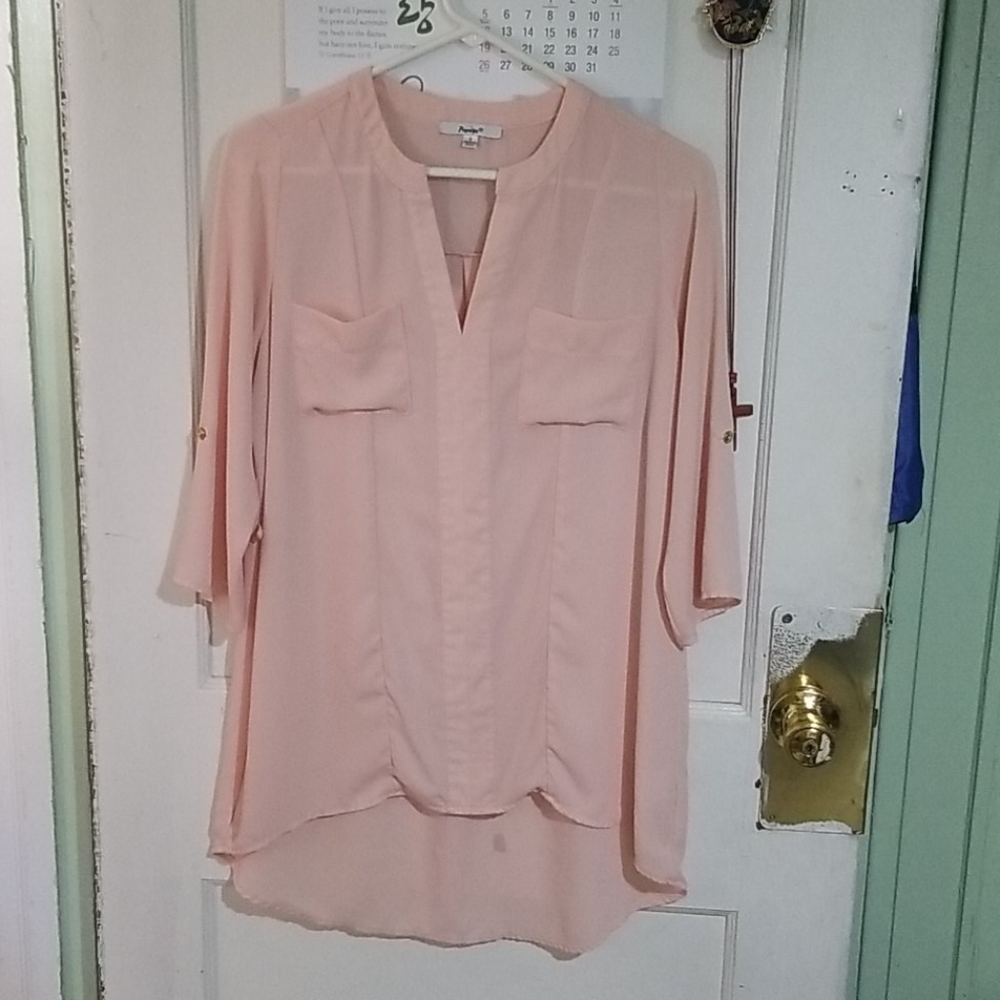 Light pink high-low blouse